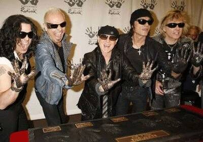 Scorpions band members leave their handprints as they are inducted into the Hollywood RockWalk in Hollywood, California.