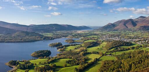 Skiddaw mountain, the town of Keswick and Derwent Water in the picturesque Lake District. William Wordsworth lived in this region for most of his life and drew much inspiration for his Nature writings from these pleasing surroundings.