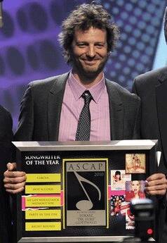 Lukasz 'Dr Luke' Gottwald accepts the Songwriter of the Year award at the 27th Annual ASCAP Pop Music Awards in Los Angeles.