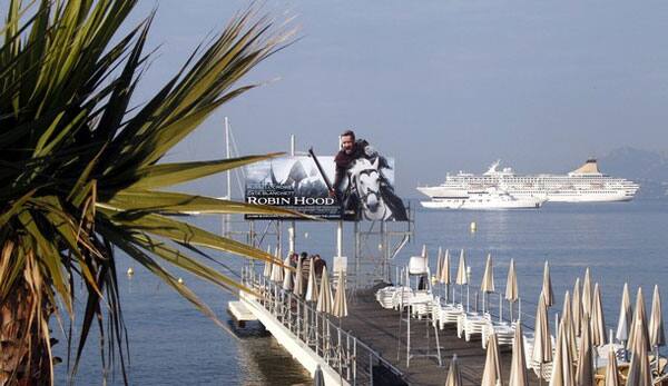 A billboard for the film ''Robin Hood'' by director Ridley Scott is seen on the Carlton pier before the start of the 63rd Cannes Film Festival in Cannes