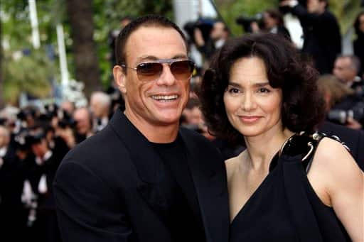 Actor Jean-Claude Van Damme, left, and Gladys Portugues arrive at the premiere for the film 