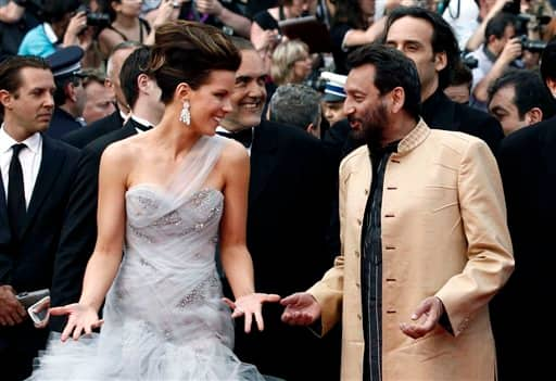 Jury members, Kate Beckinsale, left, and Shekhar Kapur arrive at the premiere for the film 