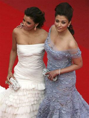 Actress Aishwarya Rai, right, and actress Eva Longoria, left, arrive on the red carpet for the premiere for the film 