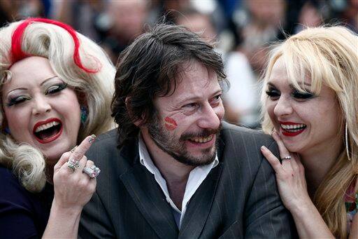 Actress Dirty Martini, French director and actor Mathieu Amalric and actress Julie Atlas Muz attend a photo call for Tournee, at the 63rd international film festival, in Cannes.