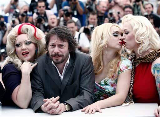 From left, actress Dirty Martini, French director and actor Mathieu Amalric, actress Julie Atlas Muz and Mimi Le Meaux attend a photo call for Tournee, at the 63rd international film festival, in Cannes.