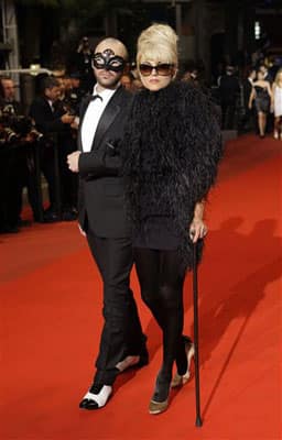 Actress and musician Melody Gardot, right, and an unidentified guest arrive for the screening of 