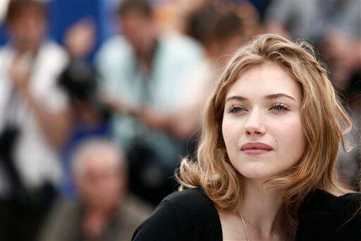 Actress Imogen Poots poses for photographers during a photo call for 