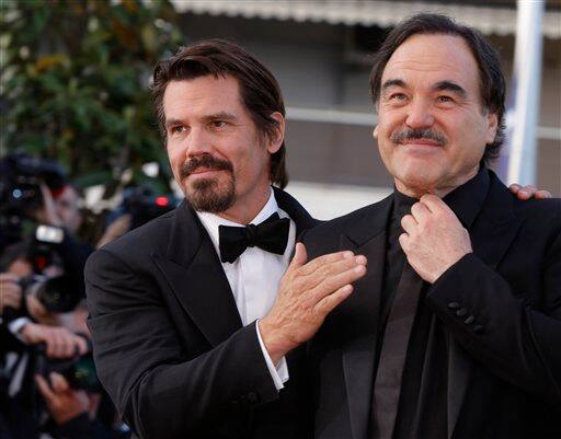 Actor Josh Brolin and director Oliver Stone arrive for the screening of 