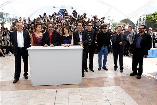 Jury members, from left, Alberto Barbera, Kate Beckinsale, Tim Burton, Giovanna Mezzogiorno, Alexandre Desplat, Benicio Del Toro, Victor Erice, Emmanuel Carrere and Shekhar Kapur during a photo call for the Jury