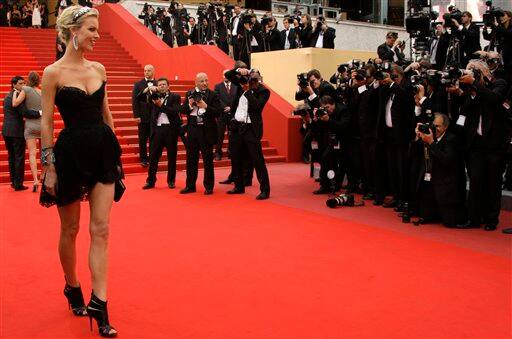 Model Eva Herzigova arrives for the premiere of 