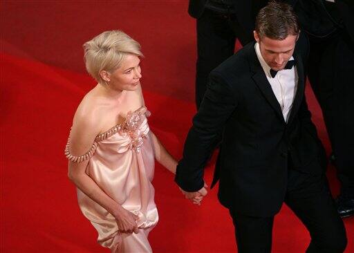 Canadian actor Ryan Gosling and U.S. actress Michelle Williams arrive for the screening of 