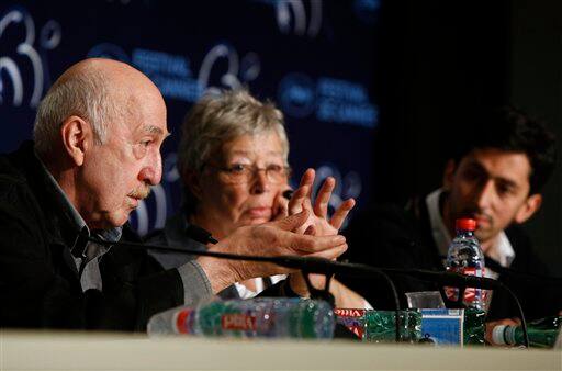 From left, filmmaker Otar Iosseliani, Martine Marignac and actor Dato Tarielashvili attend a press conference for the film 