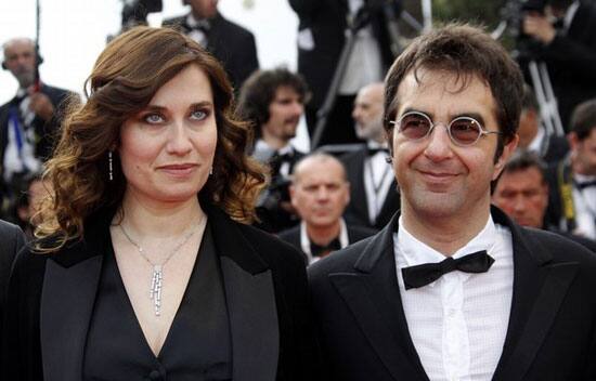 Director Atom Egoyan , Cinefondation Jury President, arrives on the red carpet with jury member and actress Emmanuelle Devos.