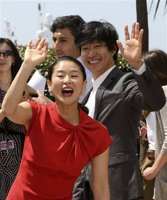 actress Ye Jiwon, left, and actor Yu Joonsang, right, pose during a photo call for 