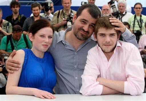 Actress Kitty Csikos, left, director Kornel Mundruczo, center, and actor Rudolf Frecska, right, pose during a photo call for 