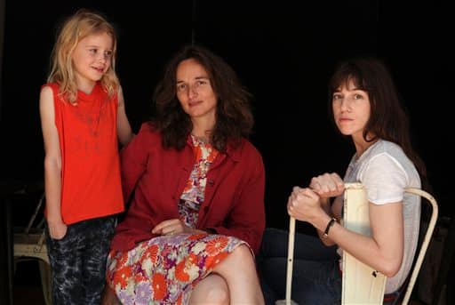 Actress Morgana Davies, left, director Julie Bertucelli, center, and actress Charlotte Gainsbourg, right, pose for photographs to promote 