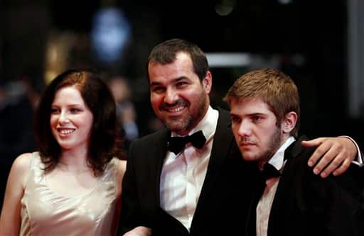 From left, actress Kitty Csikos, director Kornel Mundruczo and actor Rudolf Frecska arrive for the screening of the film 