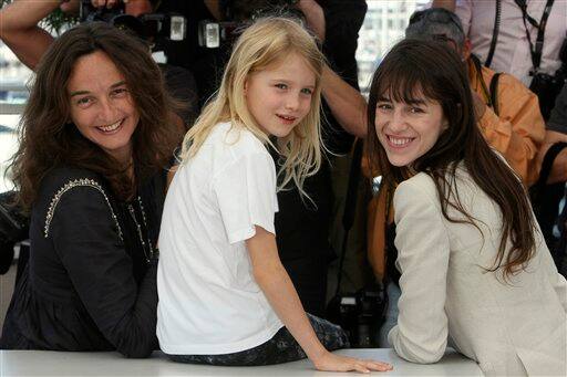 Director Julie Bertucelli, left, actress Morgana Davies, center, and actress Charlotte Gainsbourg, right, pose during a photo call for 