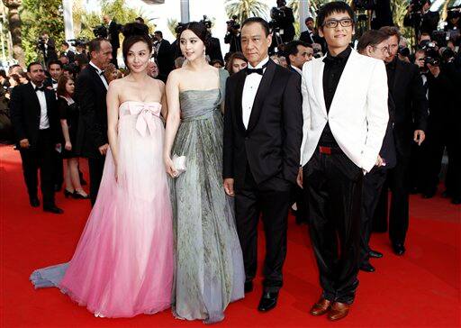 From left, actress Li Feier, actress Fan Bingbing, an unidentified guest and actor Zi Yi arrive for the awards ceremony at the 63rd international film festival, in Cannes