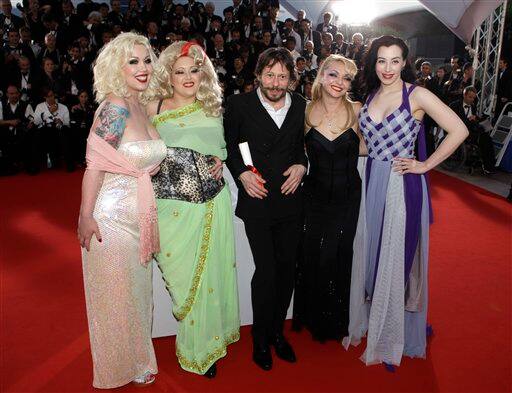 Winner of the award for Best Director director Mathieu Amalric, third from right, and actresses, from left, Mimi Le Meux, Dirty Martini, Julie Atlas Muz and Evie Lovelle pose after the awards photo call at the awards ceremony at the 63rd international film festival, in Cannes