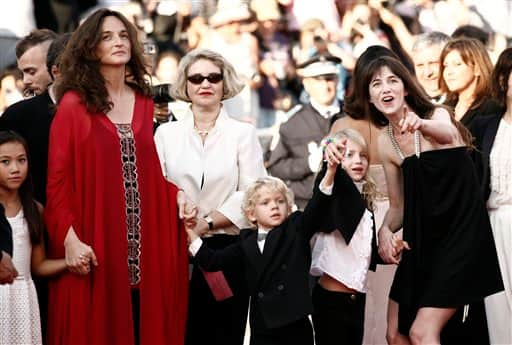 Actress Charlotte Gainsbourg, right, director Julie Bertuccelli, left and unidentified guests arrive for the awards ceremony at the 63rd international film festival, in Cannes