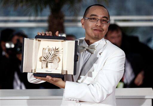 Winner of the award for Best Screenplay director Apichatpong Weerasethakul poses after the awards ceremony at the 63rd international film festival, in Cannes