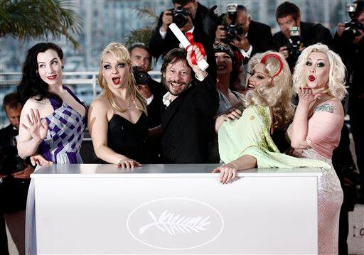 Winner of the award for Best Director director Mathieu Amalric, third from left, and actresses, from left, Evie Lovelle, Julie Atlas Muz, Kitten on the Keys, Dirty Martini and Mimi Le Meux pose after the awards ceremony at the 63rd international film festival, in Cannes