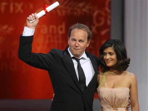 Director Xavier Beauvois, winner of the Grand Prix award, and actress Salma Hayek, right, are seen during the awards ceremony at the 63rd international film festival, in Cannes