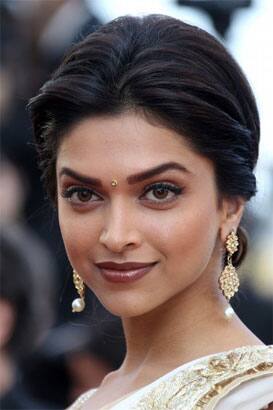 Actress Deepika Padukone arrives on the red carpet for the screening of 