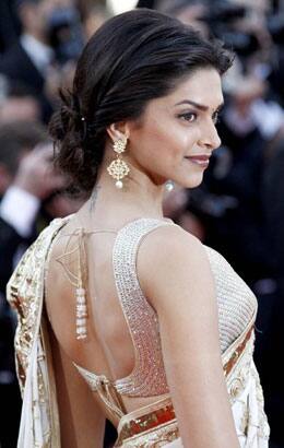 Actress Deepika Padukone arrives on the red carpet for the screening of 