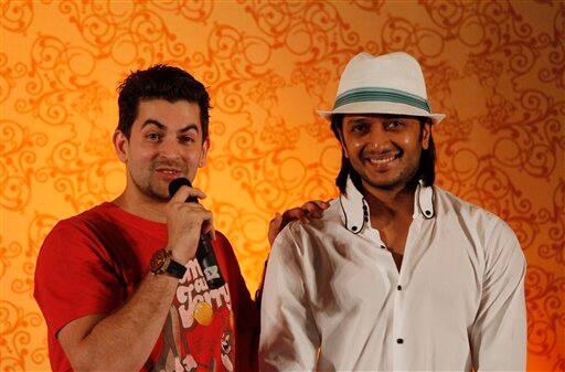 Bollywood actors Neil Nitin Mukesh, left, and Ritesh Deshmukh address a media briefing in Colombo, Sri Lanka, Thursday, June 3, 2010.