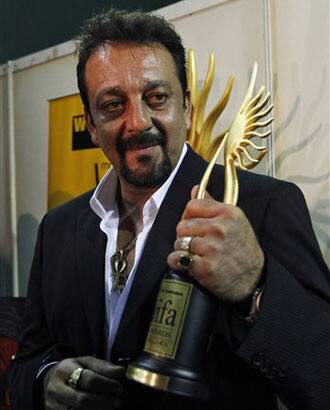 Sanjay Dutt poses with the trophy at the International Indian Film Academy, or IIFA, awards event in Colombo, Sri Lanka