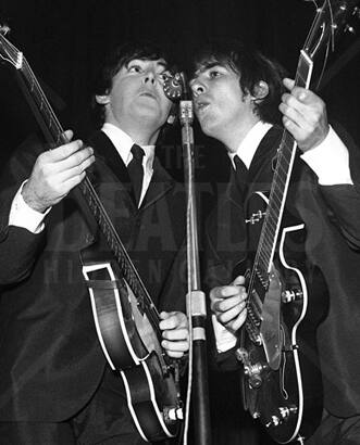 Paul and George play guitar and sing into a shared microphone; almost perfectly mirroring each other’s body language.