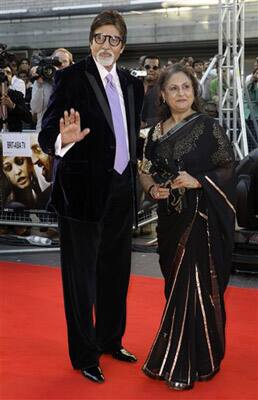 Indian actor Amitabh Bachchan arrives with wife Jaya Bachchan on the red carpet, for the World Premiere of the film Raavan, at the BFI, British Film Institute, in London.