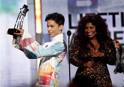 Prince accepts the Lifetime Achievement Award from Chaka Khan at the BET Awards on Sunday, June 27, 2010 in Los Angeles.