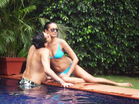 Gautam gets intimate with Viveka by the pool side.