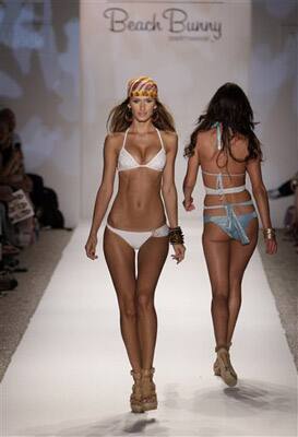 A model walks down the runway during the Beach Bunny Swimwear 2011 collection show at the Mercedes-Benz Fashion Week Swim in Miami Beach, Fla.