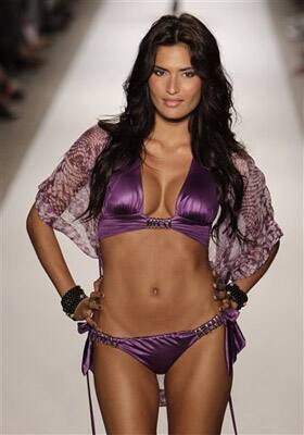 A model walks down the runway during the Beach Bunny Swimwear 2011 collection show at the Mercedes-Benz Fashion Week Swim in Miami Beach, Fla.