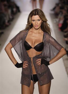 A model walks down the runway during the Beach Bunny Swimwear 2011 collection show at the Mercedes-Benz Fashion Week Swim in Miami Beach, Fla.