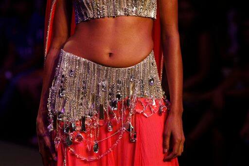 A model displays a creation by Indian designer Raakesh Agarvwal at the Pearls Infrastructure Delhi Couture Week 2010 in New Delhi, India.