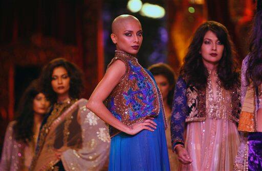 Models display creations by Indian designer Manish Malhotra at the Pearls Delhi Couture Week 2010 in New Delhi, India, Tuesday, July 20, 2010.