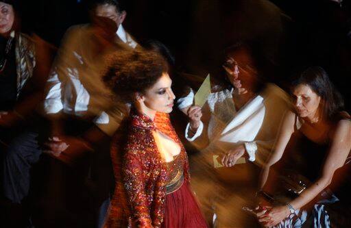 A model displays a creation by Indian designer Rohit Bal at the Pearls Delhi Couture Week 2010 in New Delhi, India.