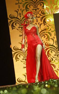 A model displays a creation by Indian designer Manav Gangwani at the Pearls Delhi Couture Week 2010 in New Delhi, India