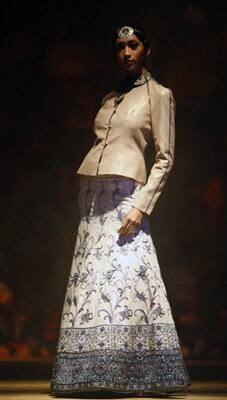 A model displays a creation by Indian designer J J Valaya at the Pearls Infrastructure Delhi Couture Week 2010 in New Delhi, India.