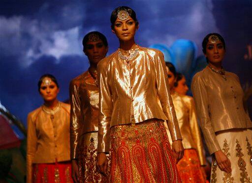 A model displays a creation by Indian designer J J Valaya at the Pearls Infrastructure Delhi Couture Week 2010 in New Delhi, India.