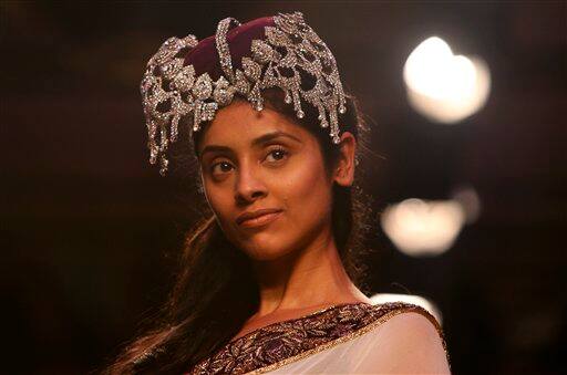 A model displays a creation by Indian designer Varun Bahl at the Pearls Infrastructure Delhi Couture Week 2010 in New Delhi, India.