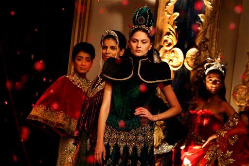 Models display creations by Indian designer Varun Bahl at the Pearls Infrastructure Delhi Couture Week 2010 in New Delhi, India.