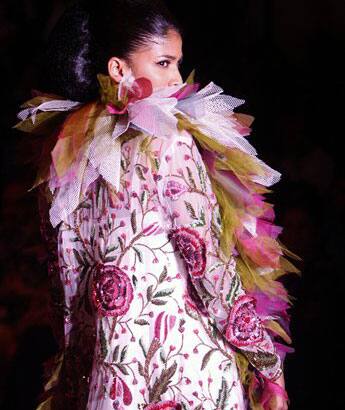 A model presents a creation by designers Abu Jani & Sandeep Khosla at the Pearls Infrastructure Delhi Couture Week 2010 in New Delhi, India.