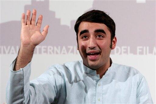 Bilawal Bhutto Zardari, son of assassinated Pakistani politician Benazir Bhutto, waves to photographers during a photocall to present the documentary 