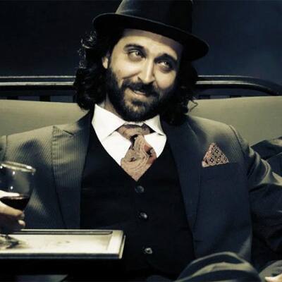 Hrithik Roshan looks dapper in a still from ‘Guzaarish’.